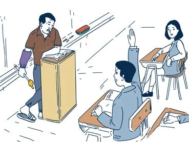 Un professeur et un élève échangent en classe.